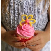 530_IMG_8184_holding sparkle berry cupcake