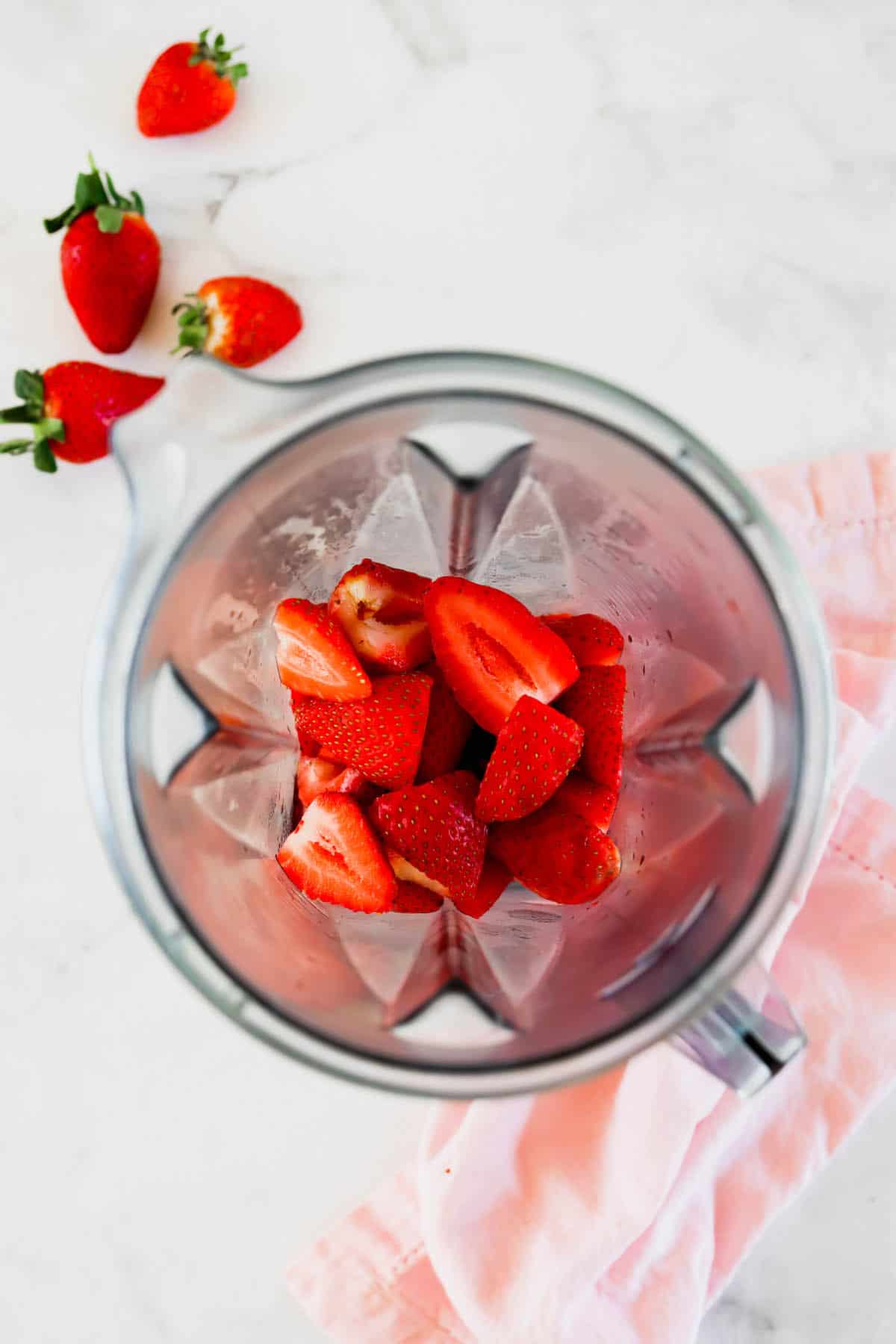 Fresh strawberries in a blender