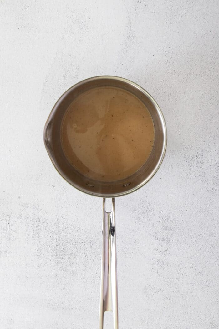 Melted butter and brown sugar in a saucepan