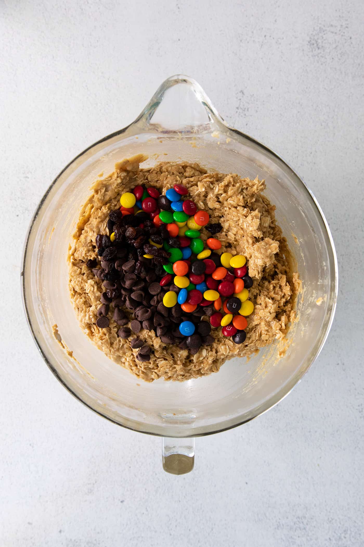 Cookie dough with M&Ms, chocolate chips, and raisins