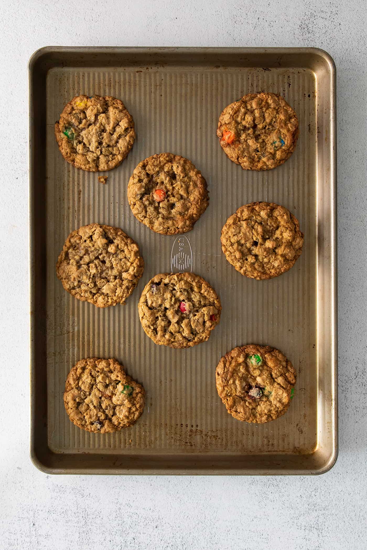 Monster cookies on a baking sheet