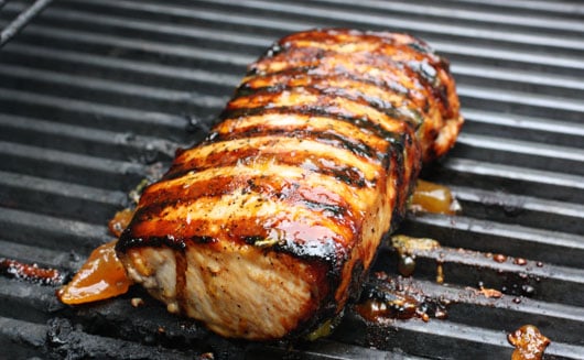 a pork tenderloin on the grill