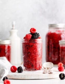 Front view of a jar of raspberry blackberry freezer jam