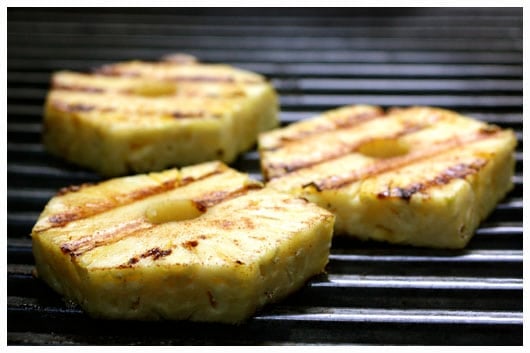 Pieces of pineapple on the grill.