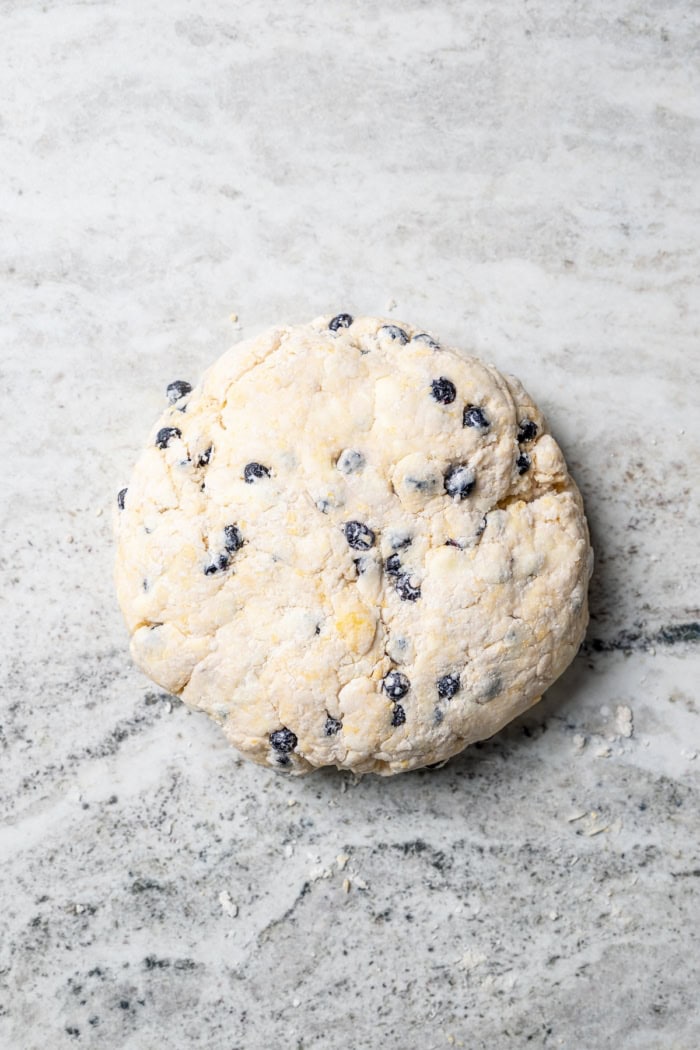Overhead view of dough for blueberry scones