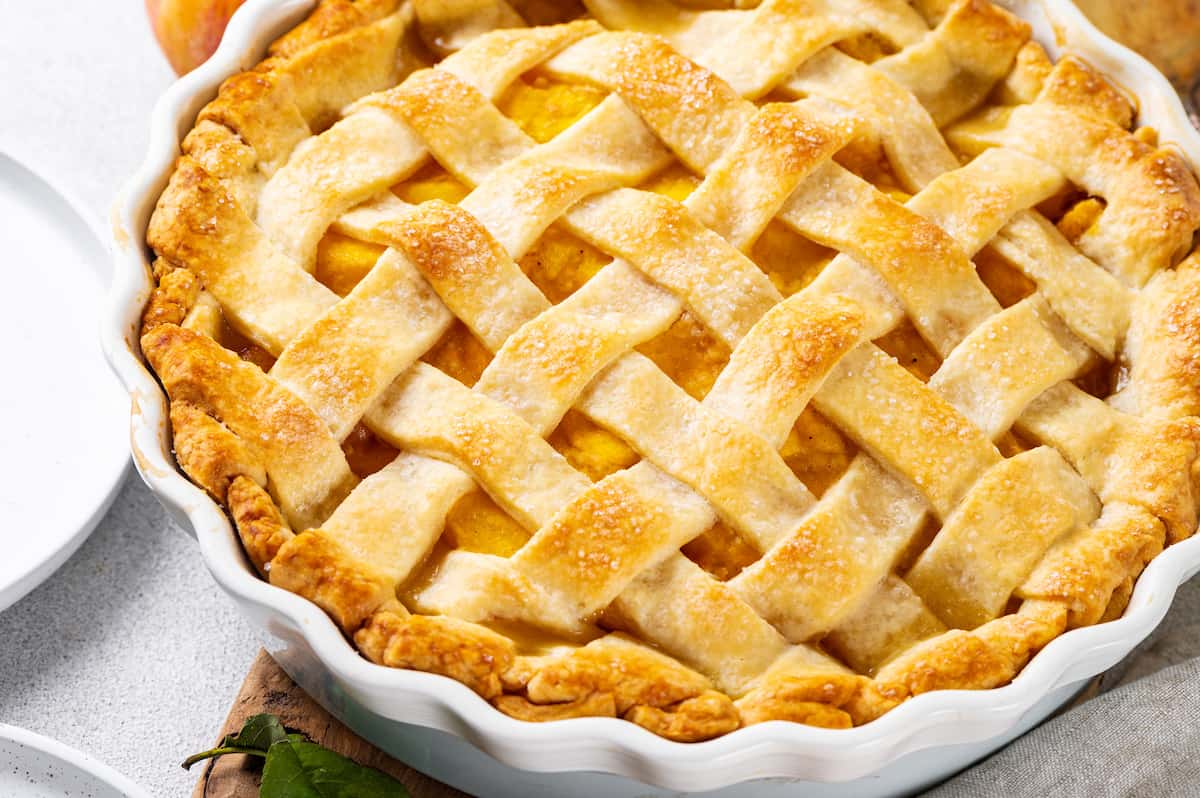 Overhead view of a homemade peach pie