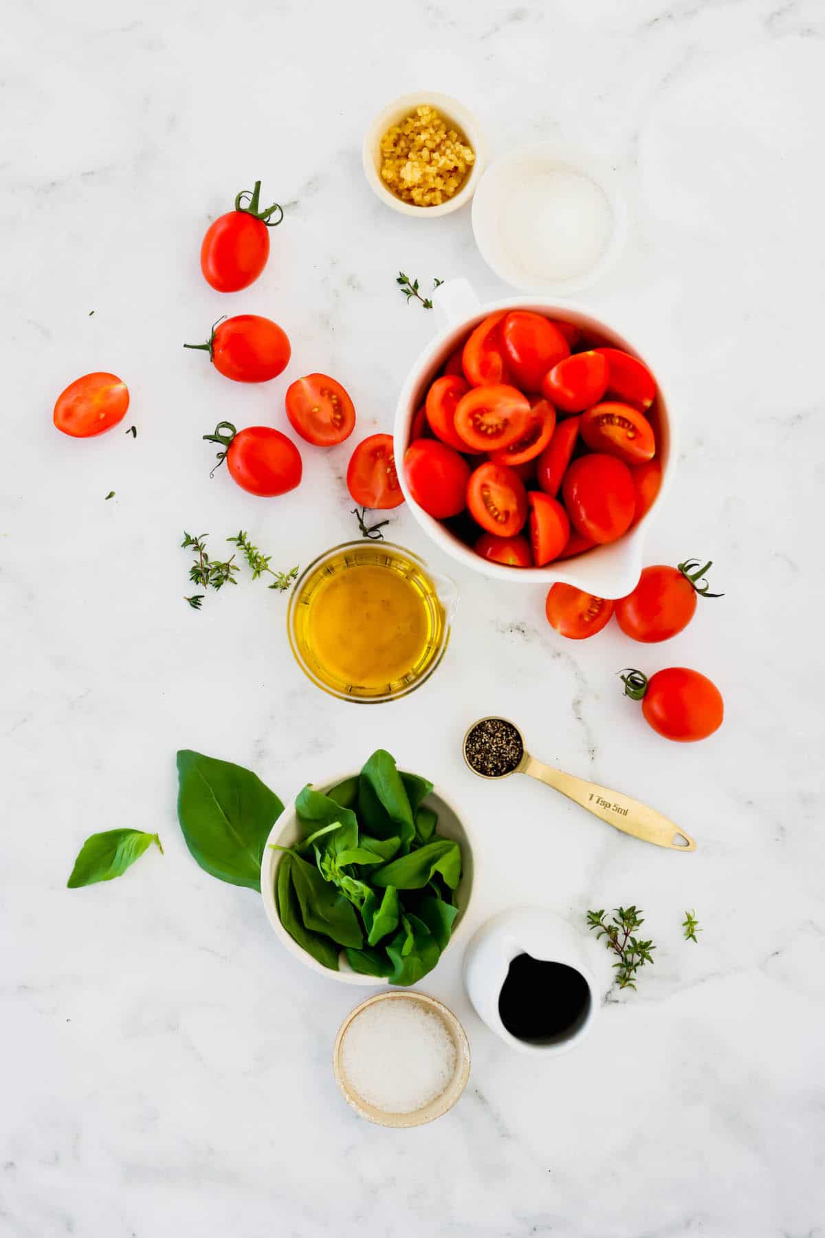 Overhead view of the ingredients to make roasted tomatoes