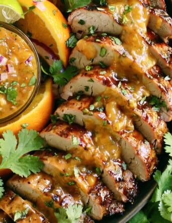 Overhead view of slices of grilled pork tenderloin