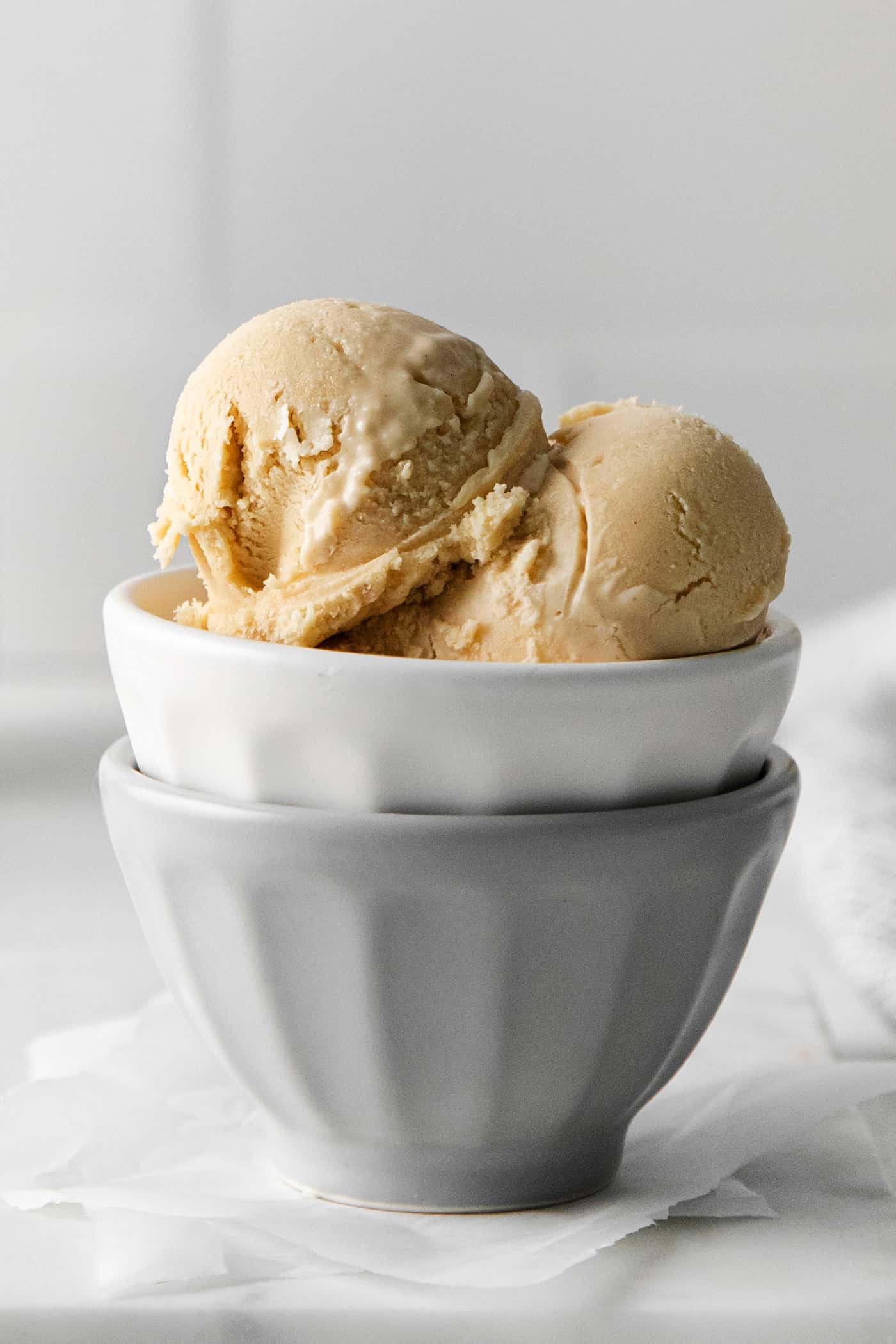 Close-up of scoops of peanut butter ice cream in a bowl