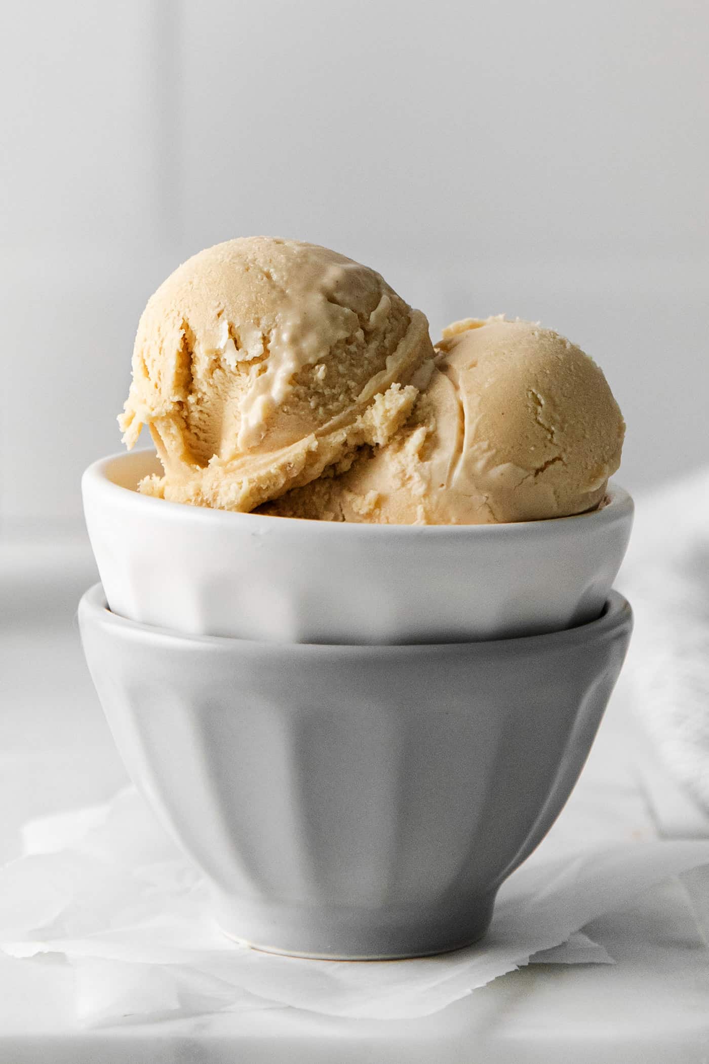Close-up of scoops of peanut butter ice cream in a bowl