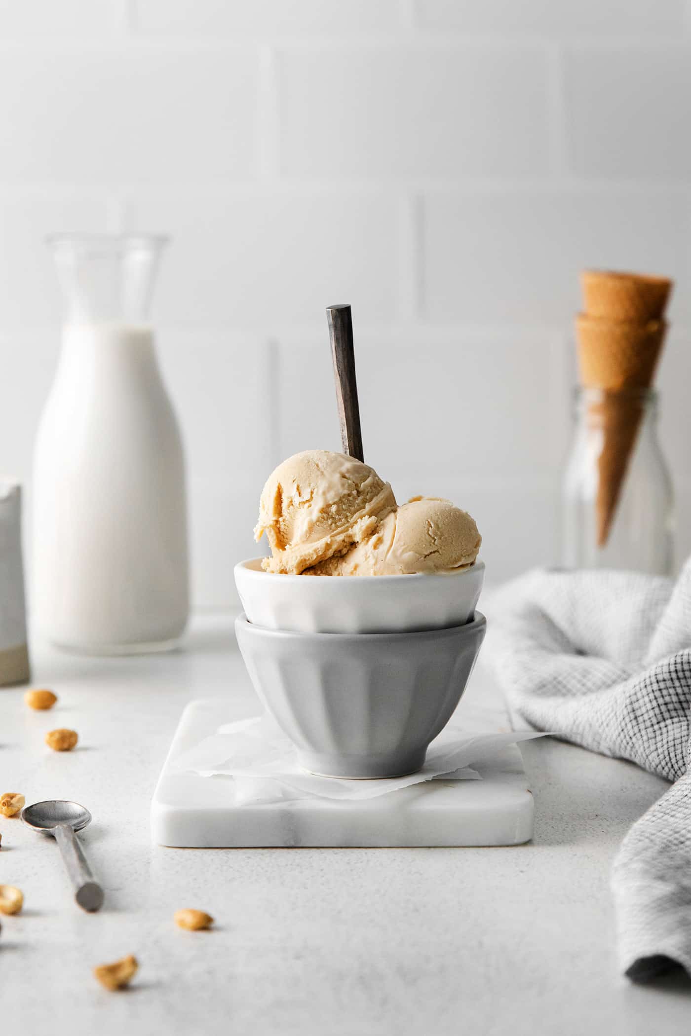 Homemade peanut butter ice cream in a bowl with a spoon