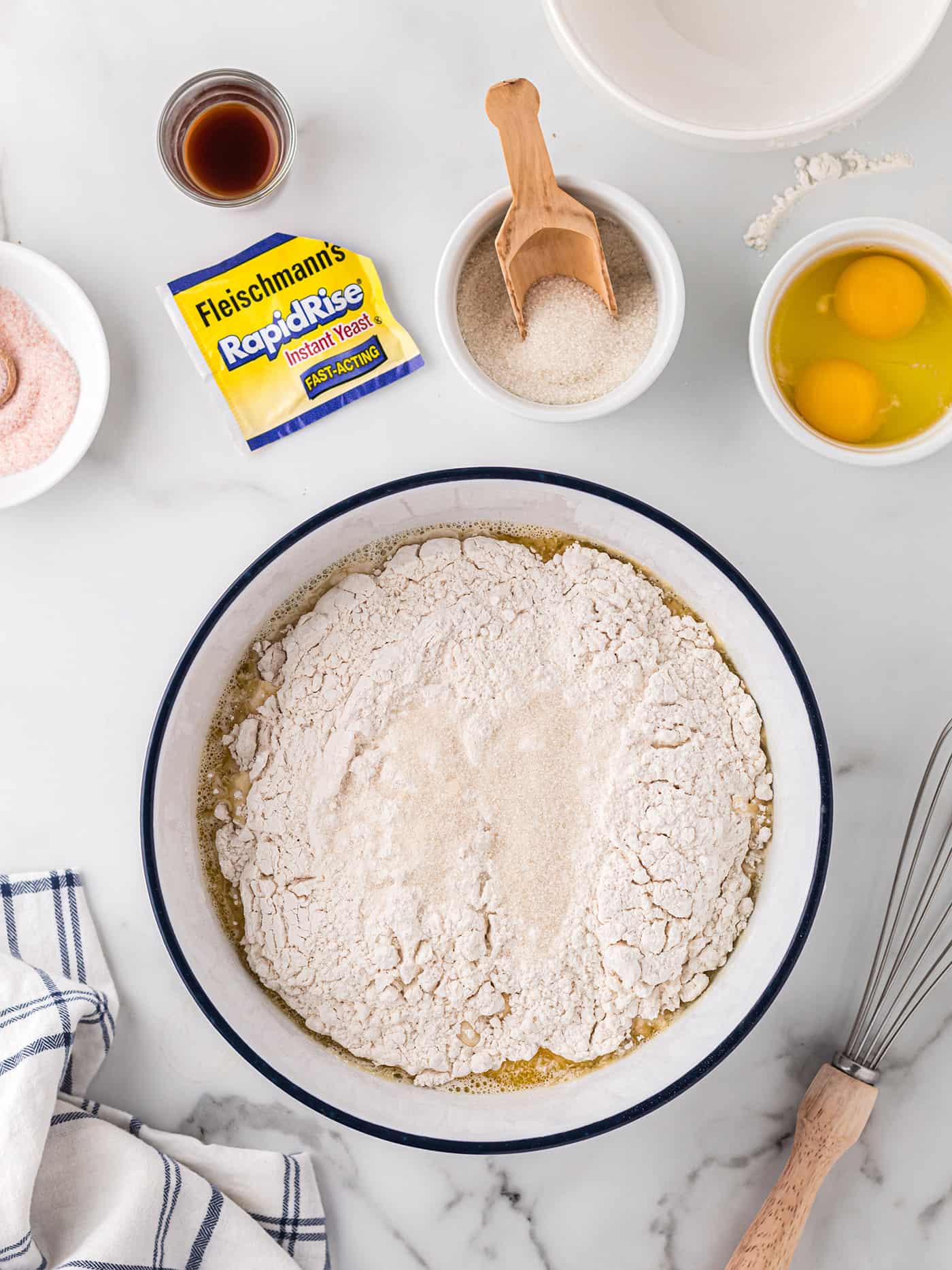 Flour added on top of a butter and milk mixture