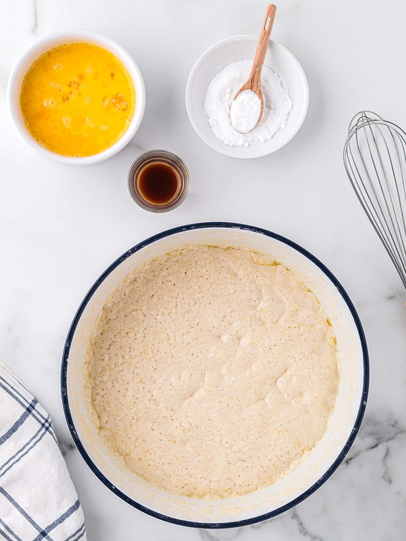 Yeasted waffle batter in a pan