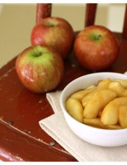 a white bowl of sautéed apples