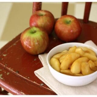 a white bowl of sautéed apples