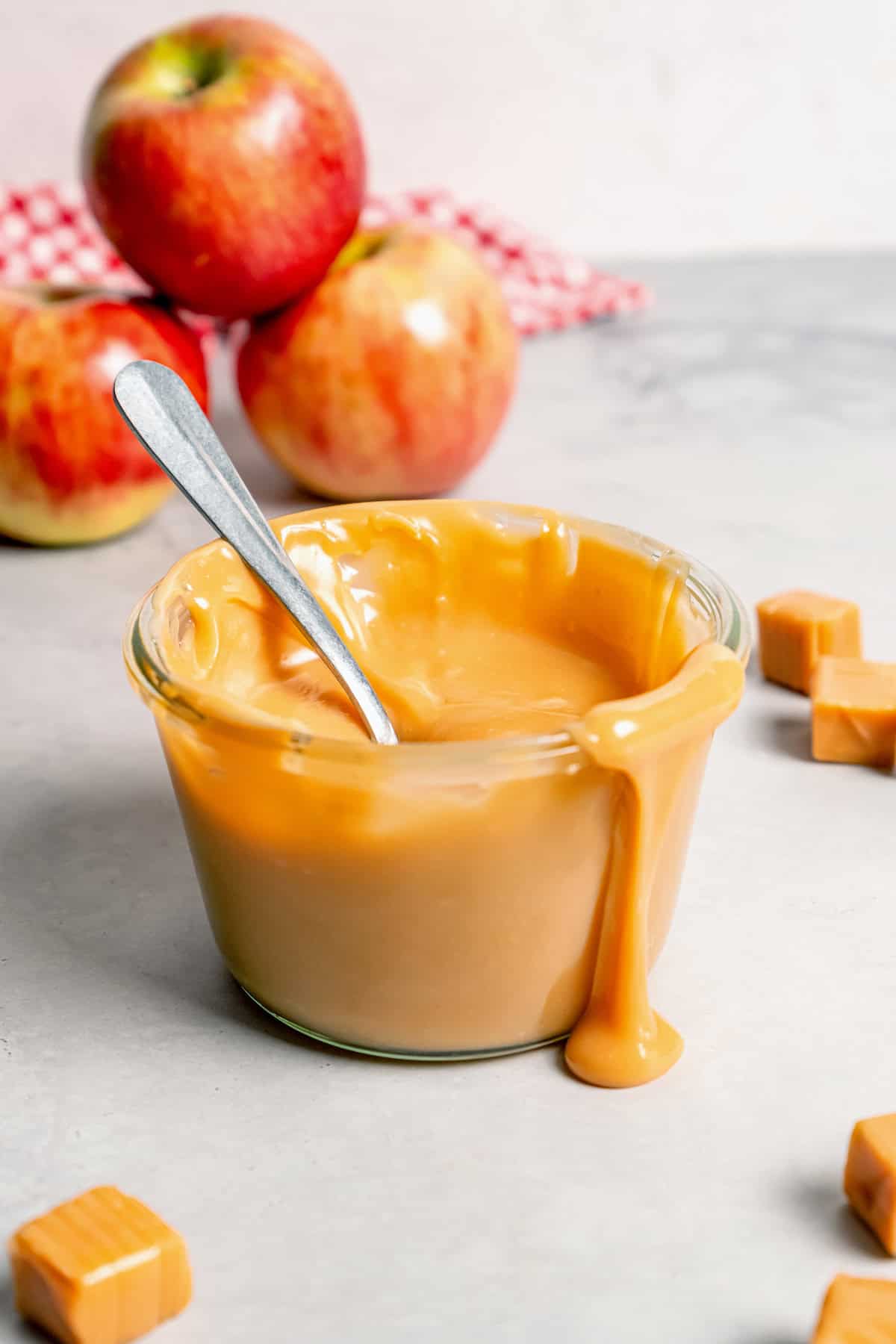 Spoon in jar of caramel apple dip