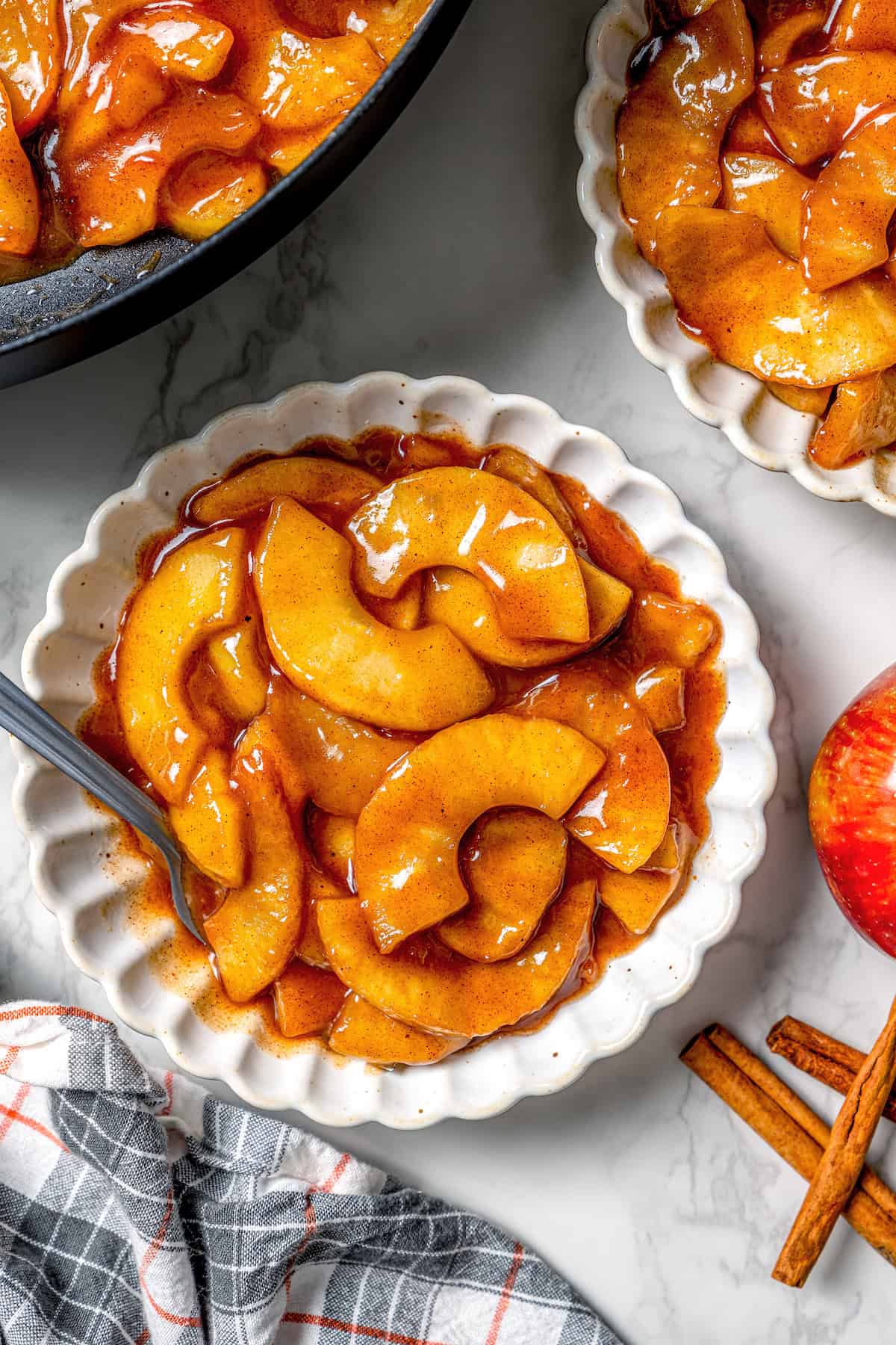 Cinnamon-spiced sautéed apples in bowls