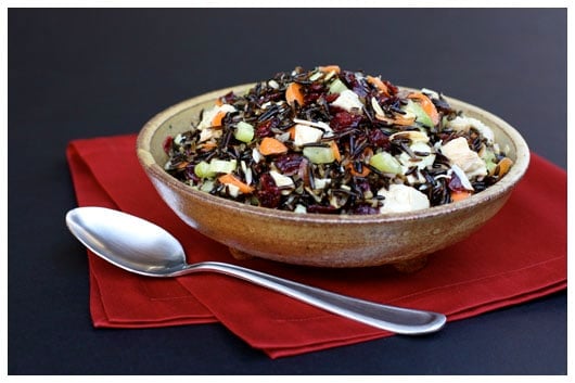 a pottery bowl of turkey and wild rice salad