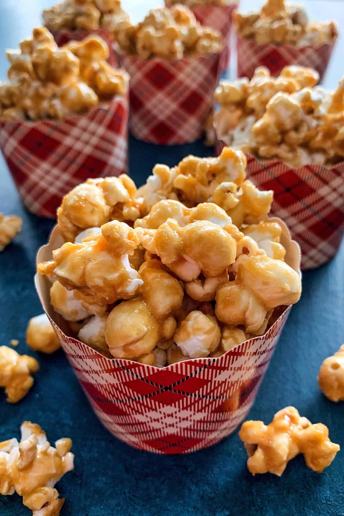 caramel corn in festive paper baking cups, for gifting