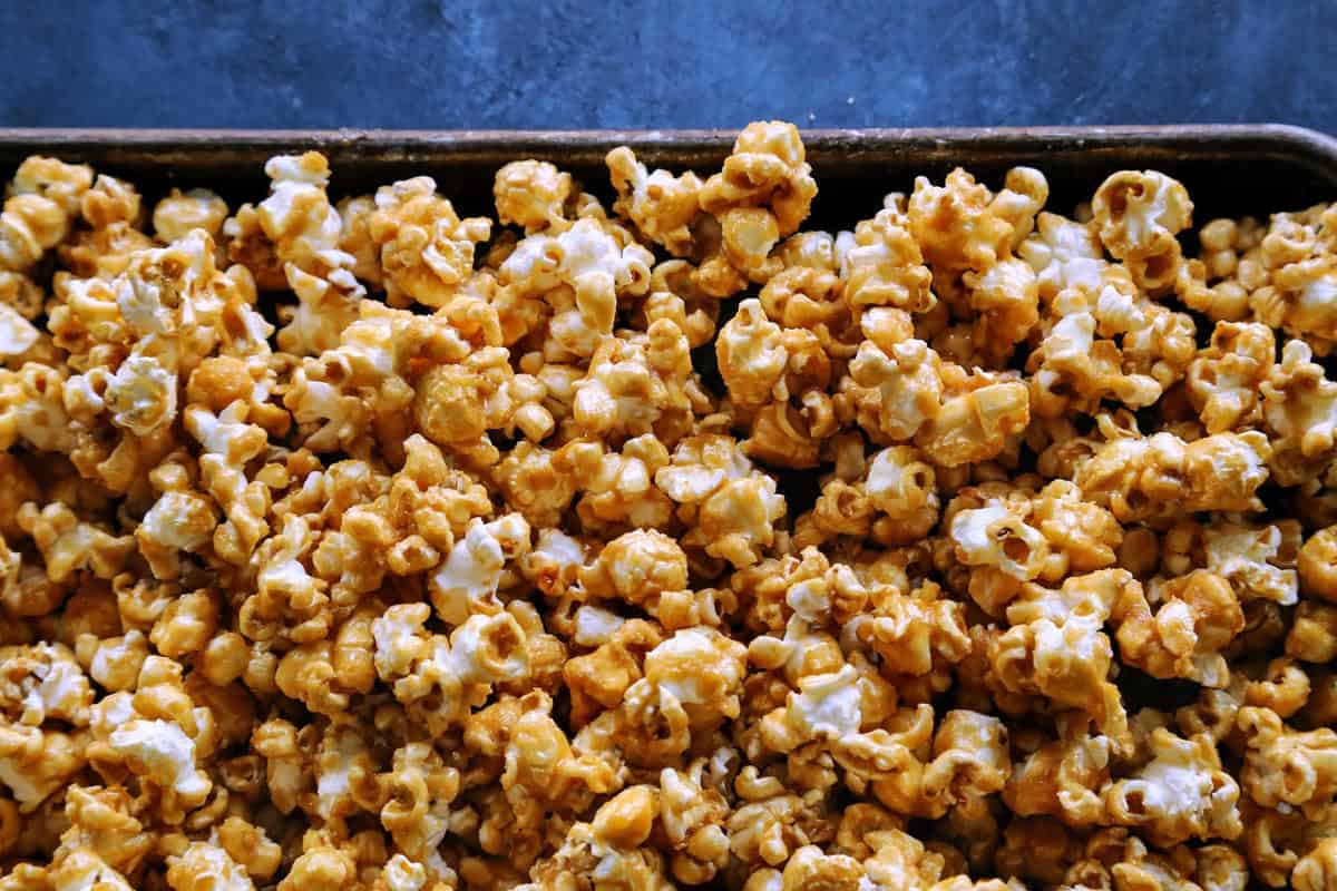 caramel corn on rimmed pan