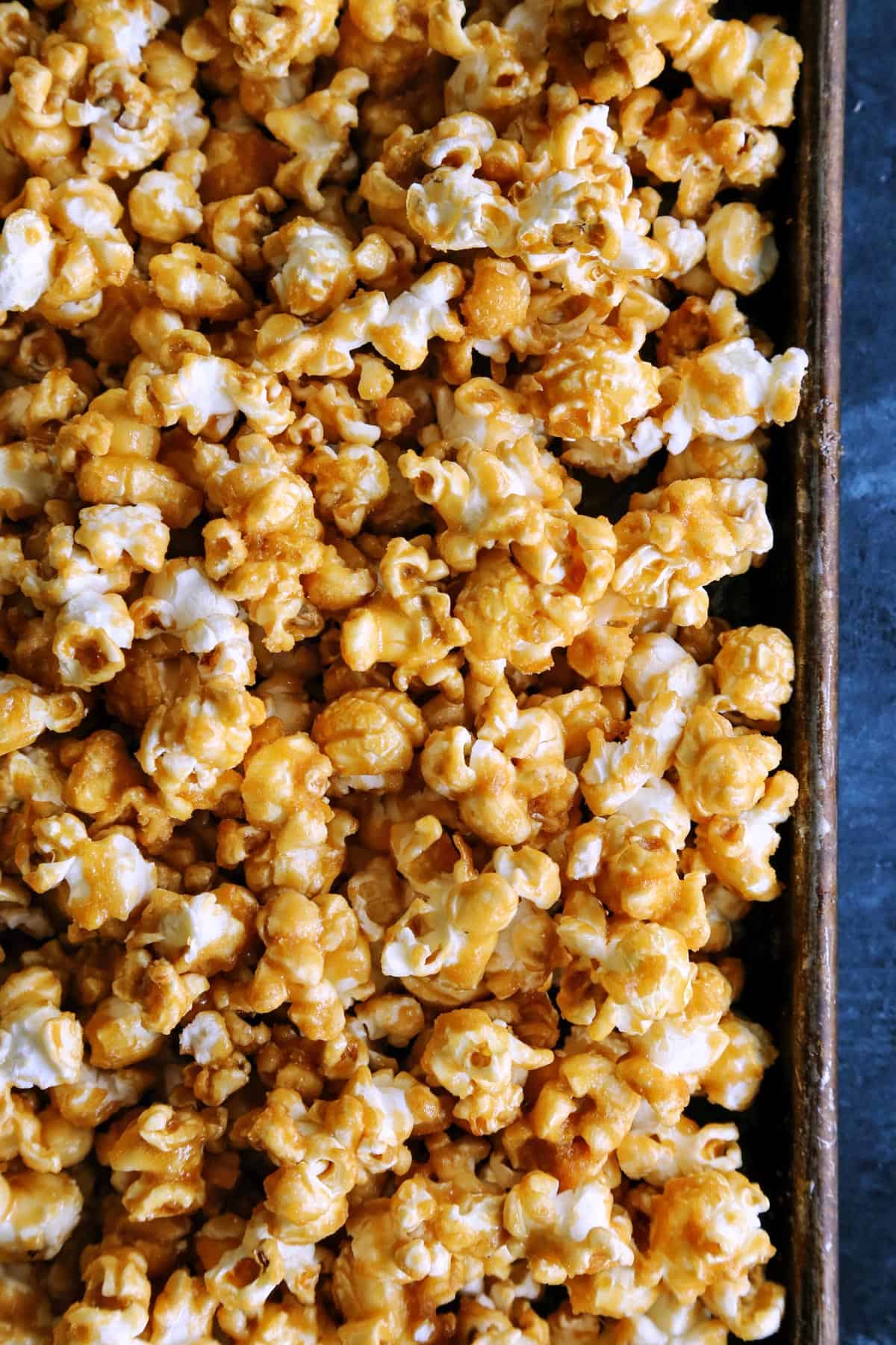 a pan of caramel covered popcorn