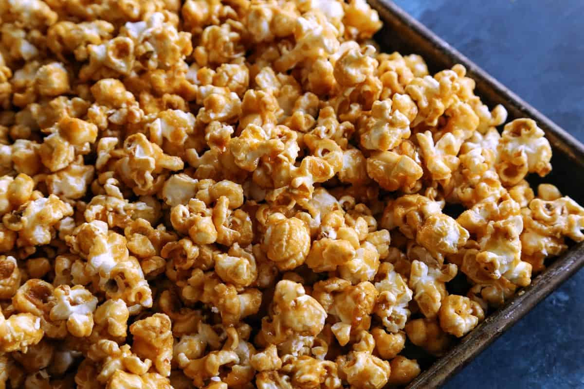 caramel corn on rimmed pan