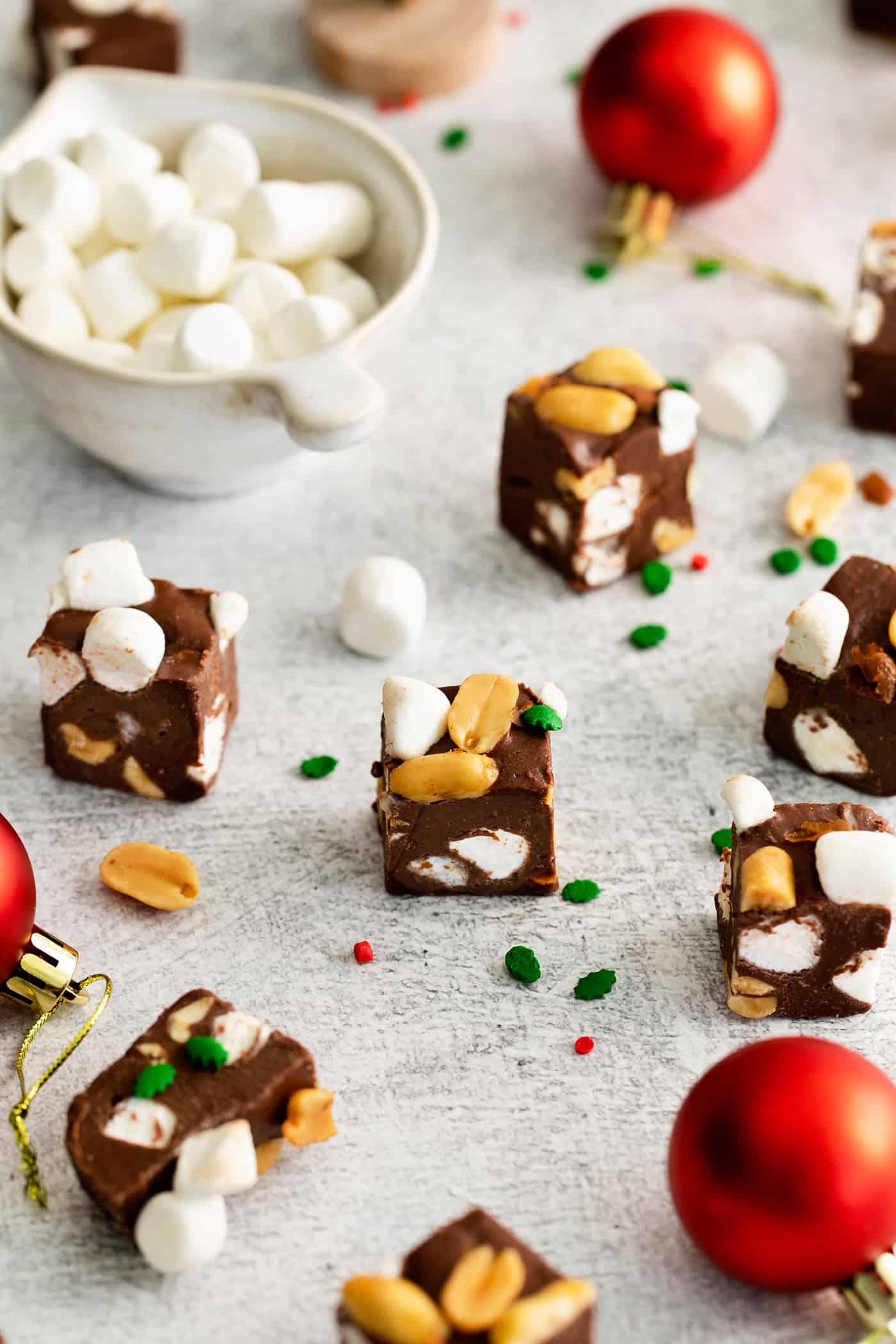 Rocky road fudge on the table with Christmas bulbs