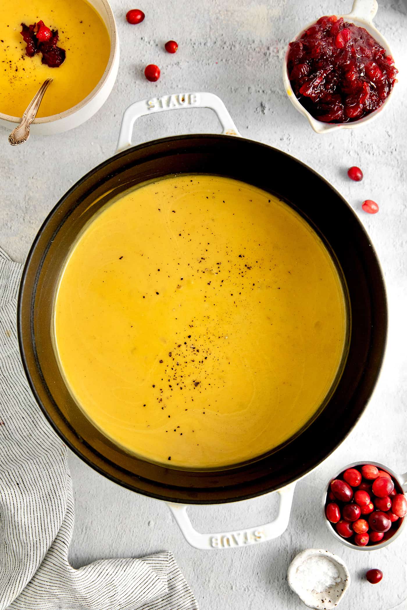Overhead view of squash soup in a pot