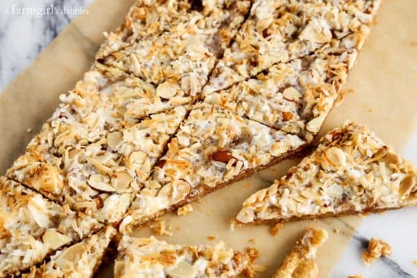 Caramel treats cut into triangles, on a marble counter