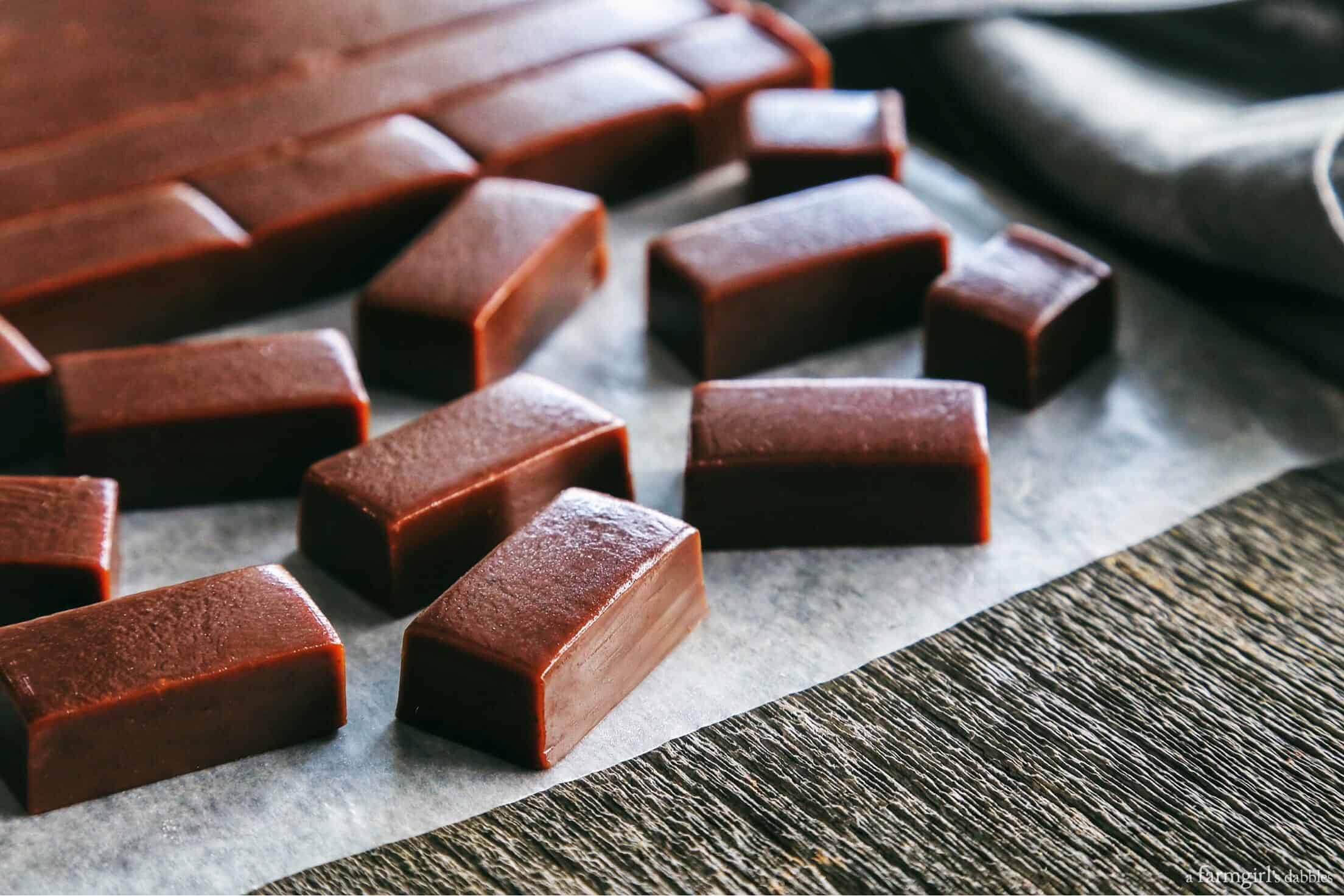 Chocolate Caramels on a wood table