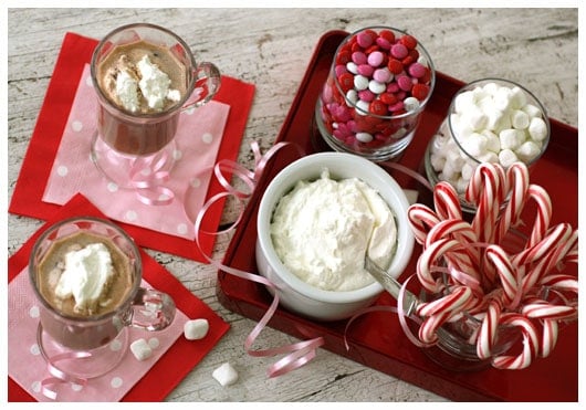 A Hot Chocolate Toppings Tray with Two Cups of Hot Cocoa