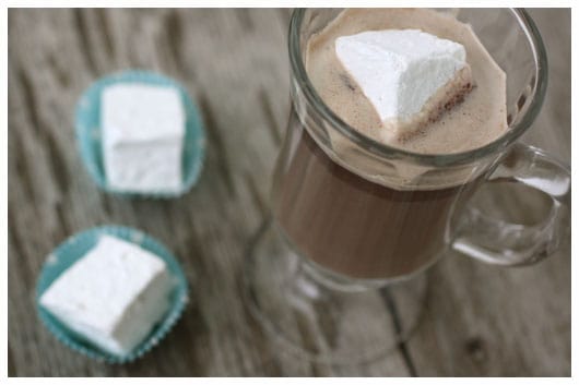 a cup of hot chocolate with a marshmallow in it