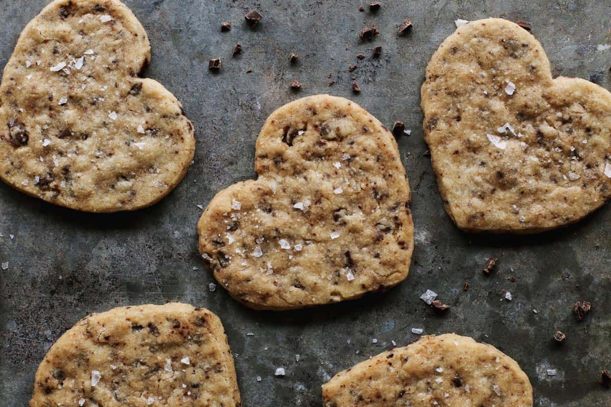 shortbread cookies speckled with chocolate, in the shape of hearts