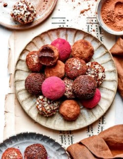 Overhead view of chocolate truffles on plate