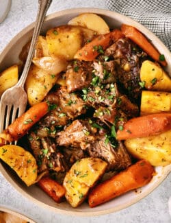 Overhead view of pot roast in a bowl