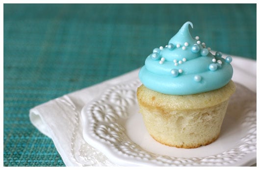 a mini cupcake on a white plate