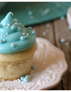 a mini cupcake with blue frosting