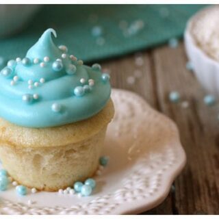 a mini cupcake with blue frosting