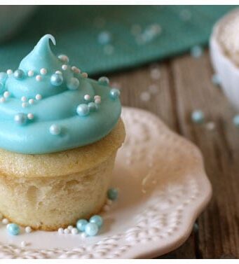 a mini cupcake with blue frosting