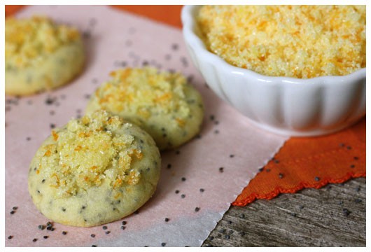 a dish of orange sugar and cookies