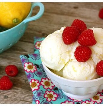 a Bowl of Lemon Buttermilk Sherbet with fresh raspberries