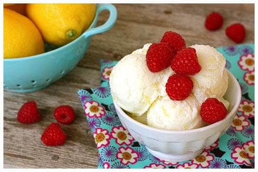 a Bowl of Lemon Buttermilk Sherbet with fresh raspberries