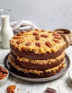 Whole German chocolate cake on platter