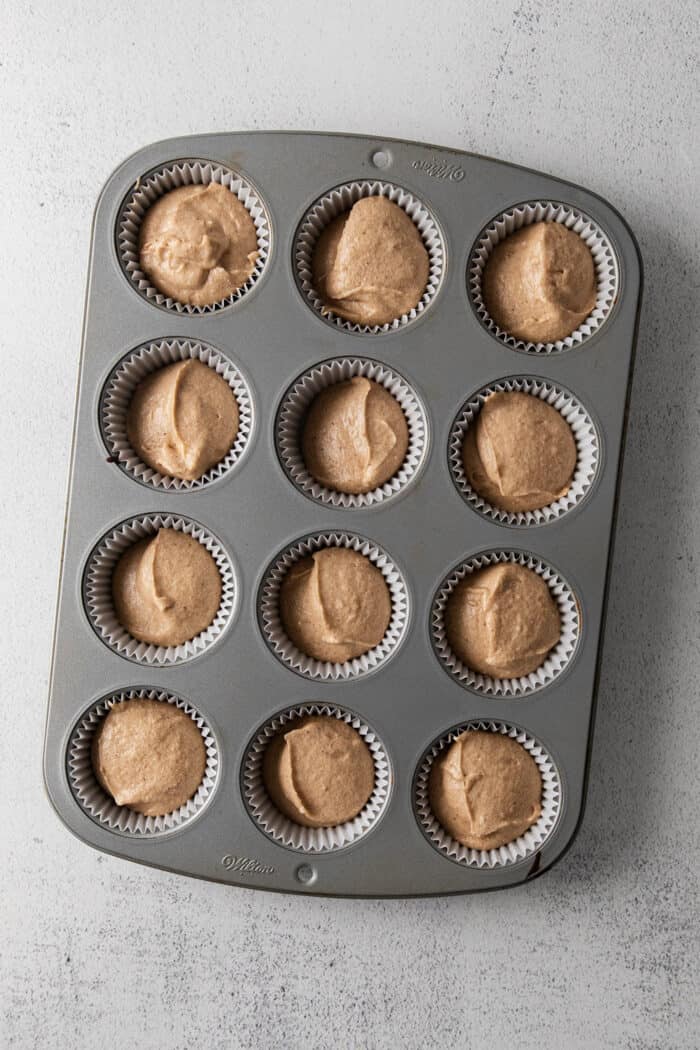 Overhead view of snickerdoodle cupcakes ready to be baked