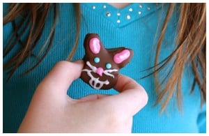 a girl holding a marshmallow bunny