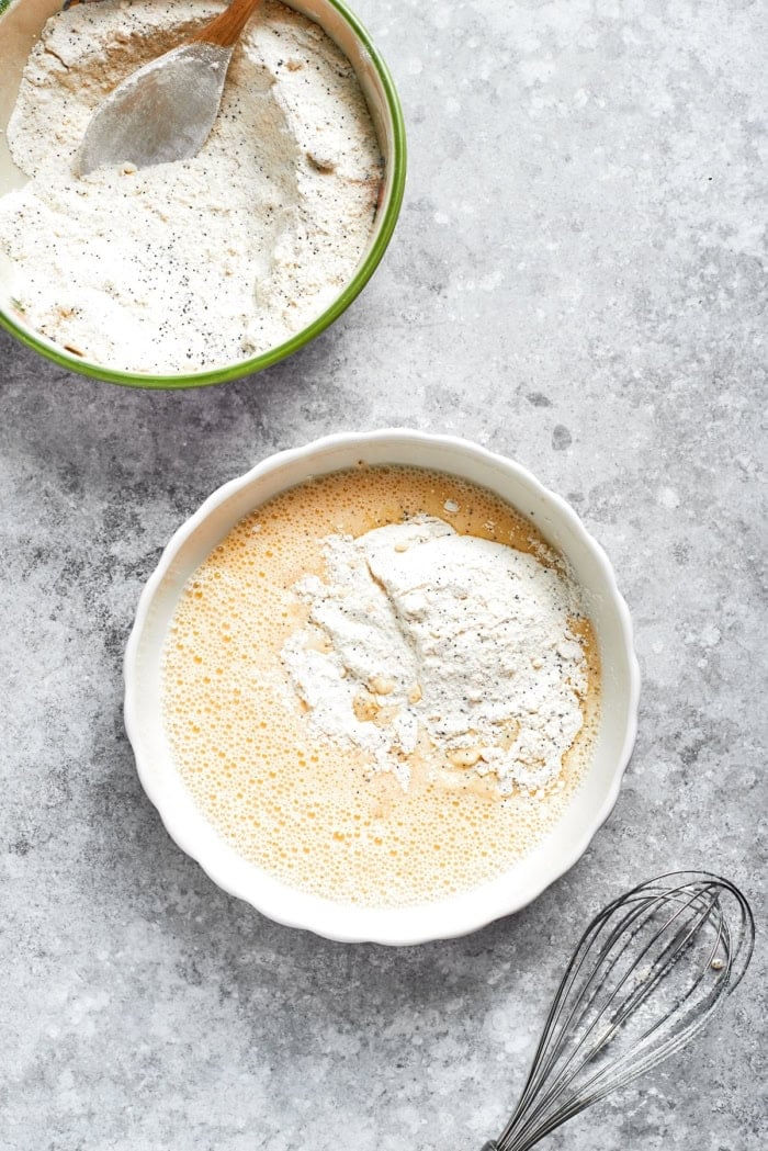 Dry ingredients added to bowl of wet ingredients.