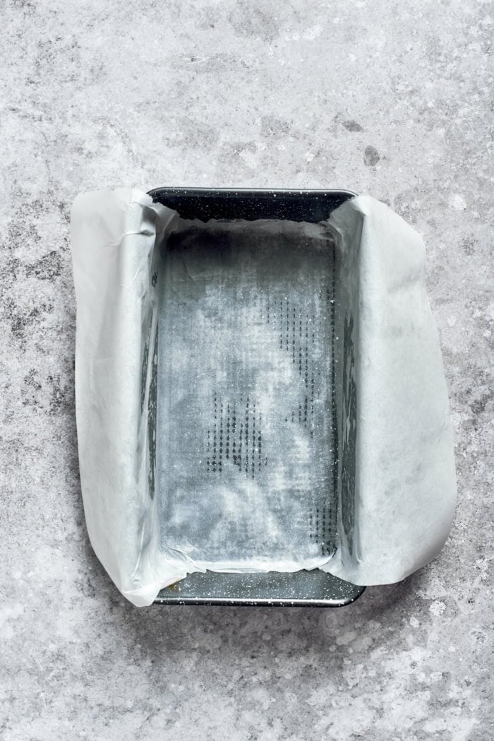 Parchment paper inside loaf pan.