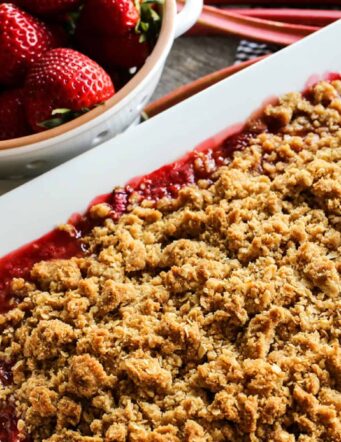 a pan of dessert crisp made with strawberries and rhubarb