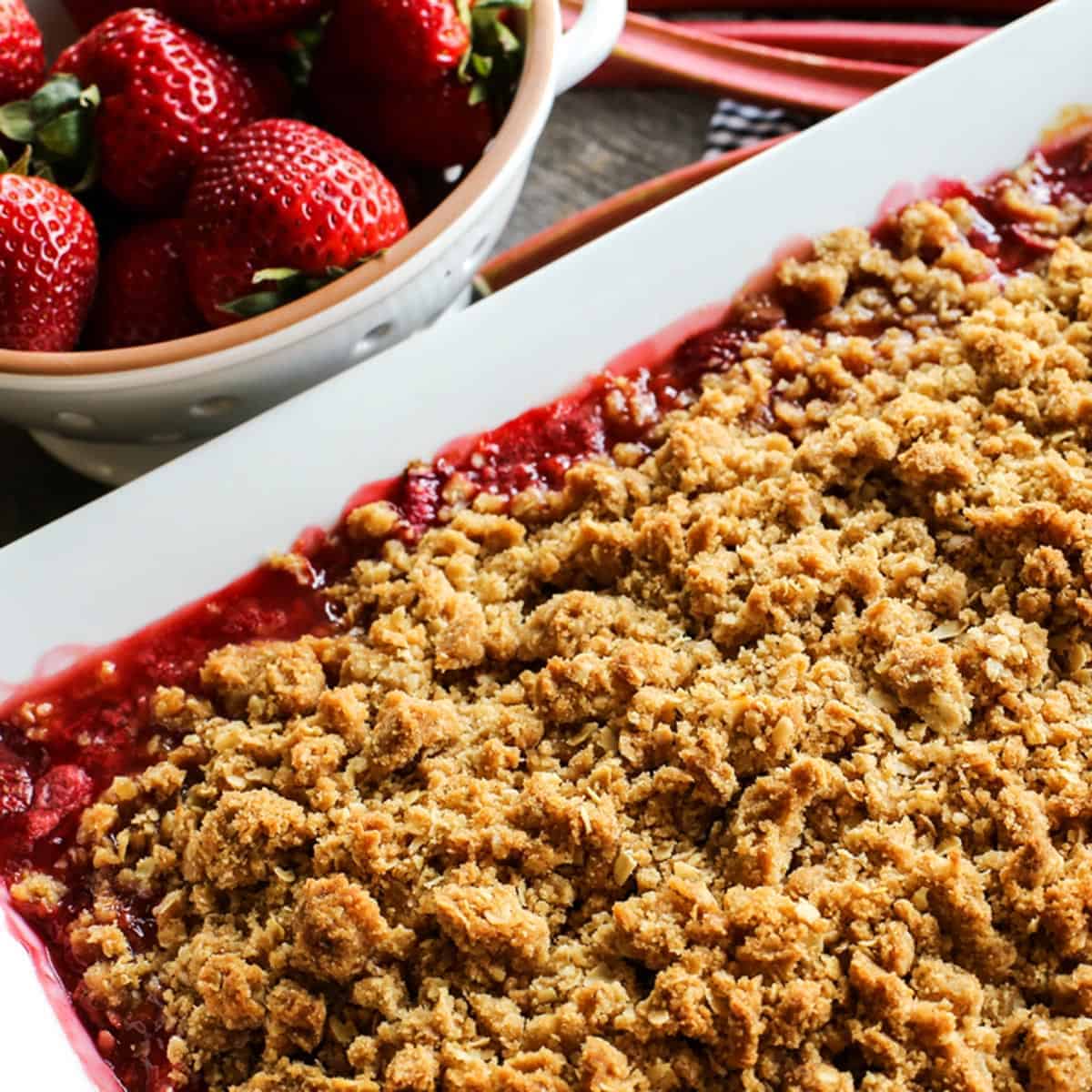 a pan of dessert crisp made with strawberries and rhubarb
