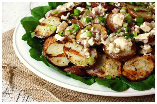 grilled potato slices topped with blue cheese